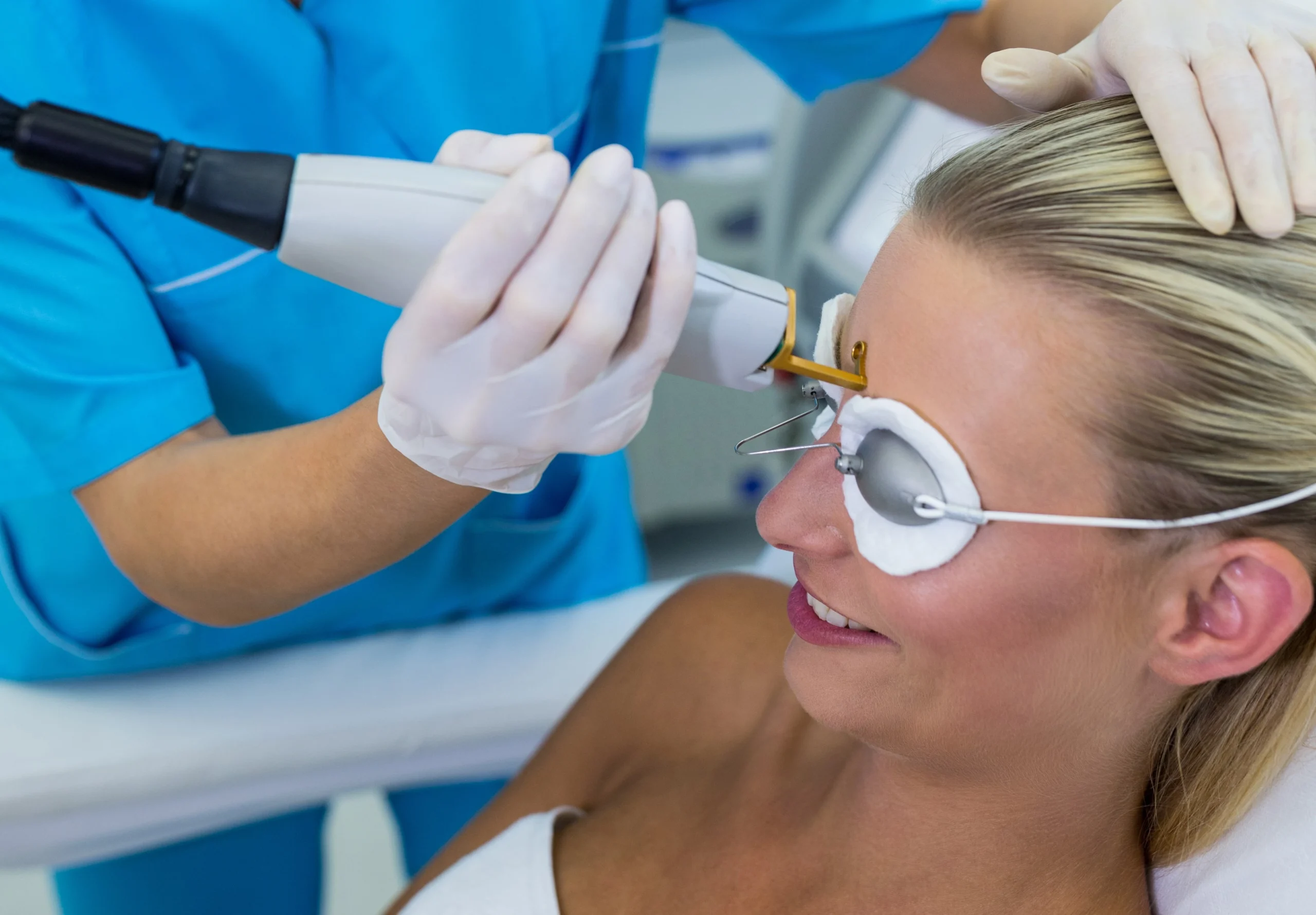 woman-receiving-laser-epilation-treatment-her-forehead